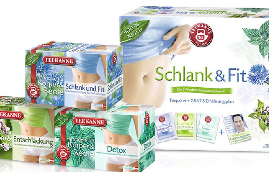 Verschiedene Packungen „TeeKanne“ Schlank & Fit Teesorten stehen auf einem Tisch.
