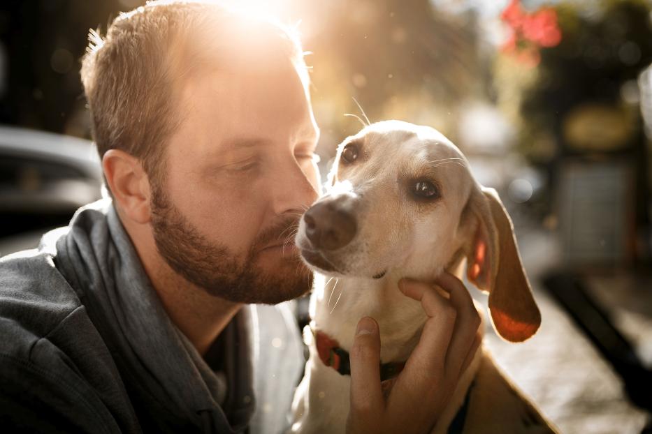 Man with his dog natural light portrait