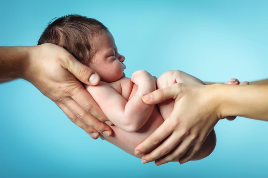 Baby in parents hands