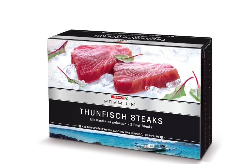 Die Verpackung von „Spar Premium Thunfisch Steaks“ zeigt zwei rohe Thunfischsteaks auf Eis.