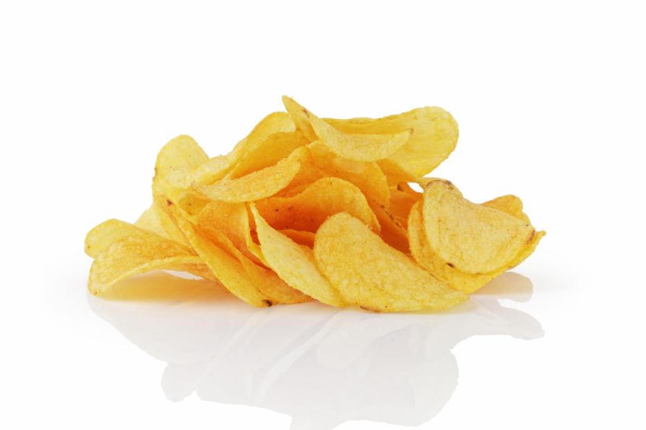 heap of potato chips with paprika