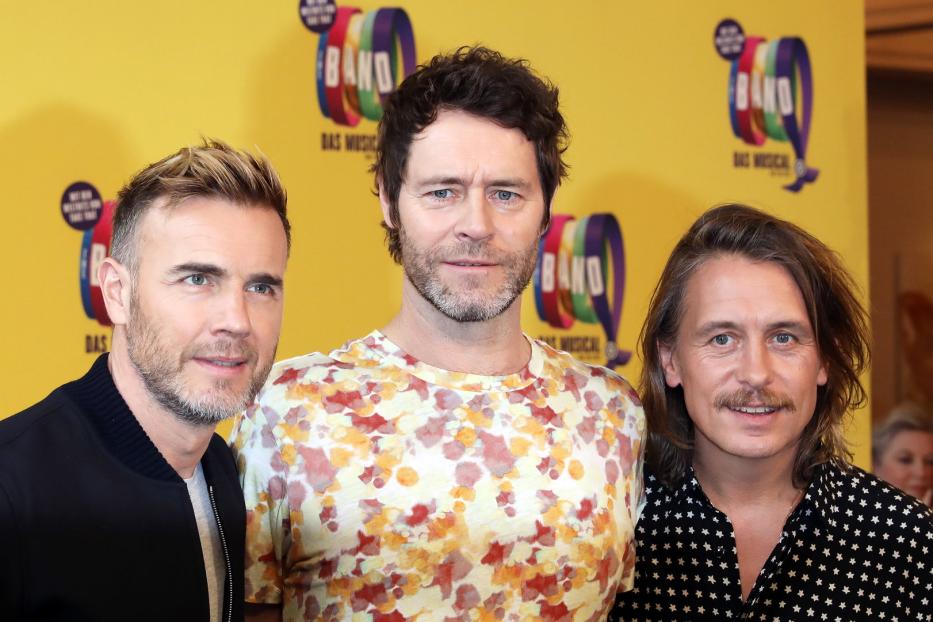 Gary Barlow, Mark Owen und Howard Donald von Take That