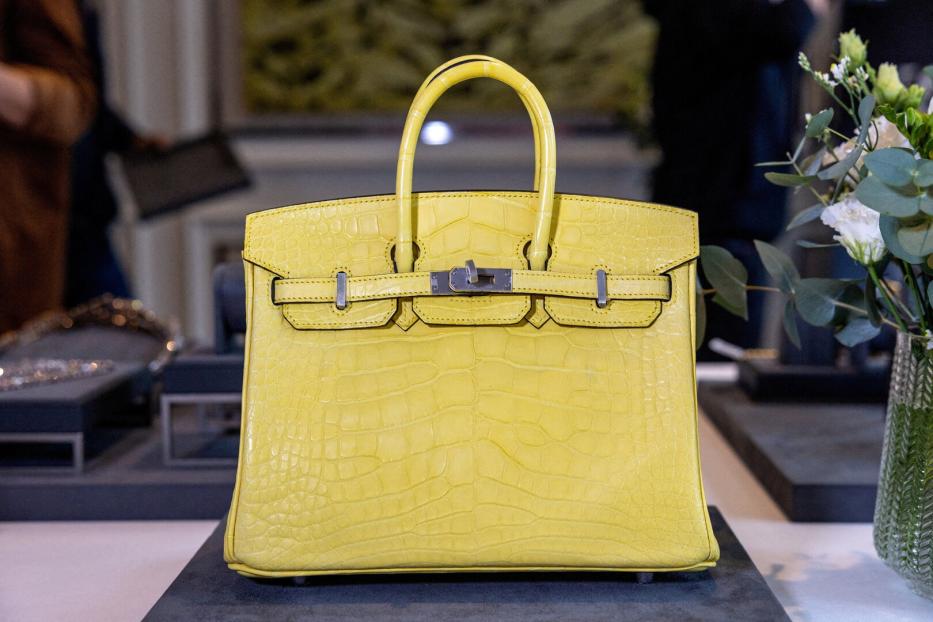 FILE PHOTO: A Mimosa Matte Mississippiensis Alligator Birkin handbag by Hermes is pictured during an auction preview at Sotheby's in Geneva