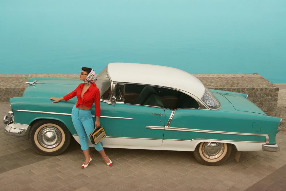 Beautiful Pin-Up Girl  Near The Vintage Car