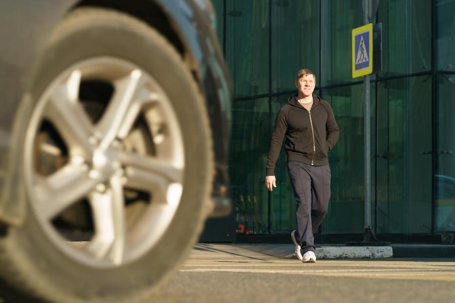Photography of handsome man in spring sunny day outdoors