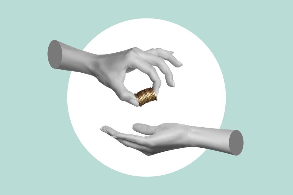 A woman's hand holds coins and hands them to a man