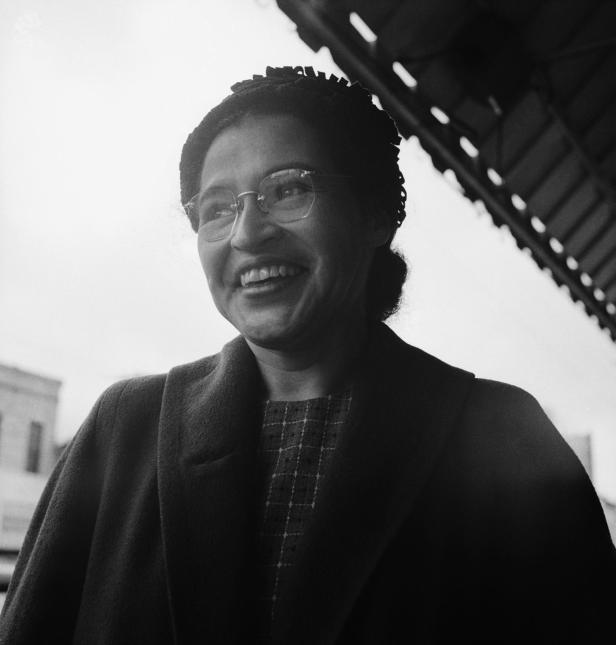 American civil rights activist Rosa Parks smiling after a Supreme Court ruling banning segregation on city public transit vehicles took effect. Parks' arrest on December 1st, 1955, for refusing to give up her seat to a white person led to the successful 381 day Montgomery bus boycott.