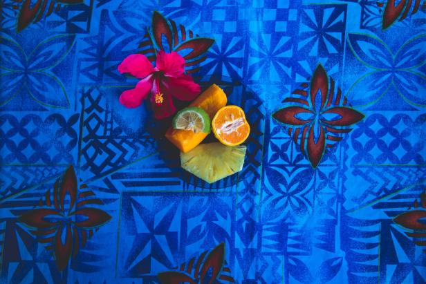 Directly Above Shot Of Fruits Served With Flower In Circle Plate On Table - Stock-Fotografie