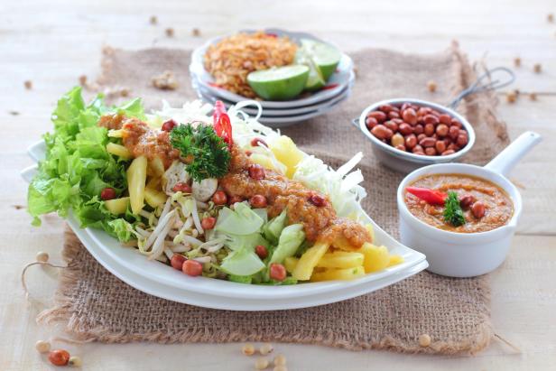 Indonesian traditional salad with peanut dressing usually called Gado-gado - Stock-Fotografie