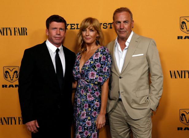 FILE PHOTO: Creator, director and executive producer Sheridan poses with cast members Costner and Reilly at a premiere for the television series "Yellowstone" in Los Angeles Taylor Sheridan