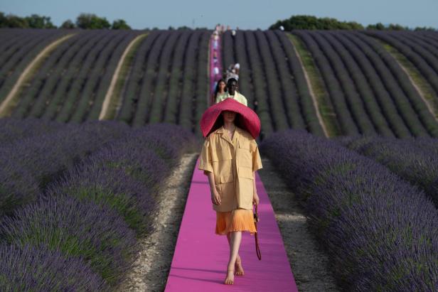 A model walks the runway during the Jacquemus Spring Summer 2020 show in Valensole, France on June 24, 2019. Photo by Aurore Marechal/ABACAPRESS.COM