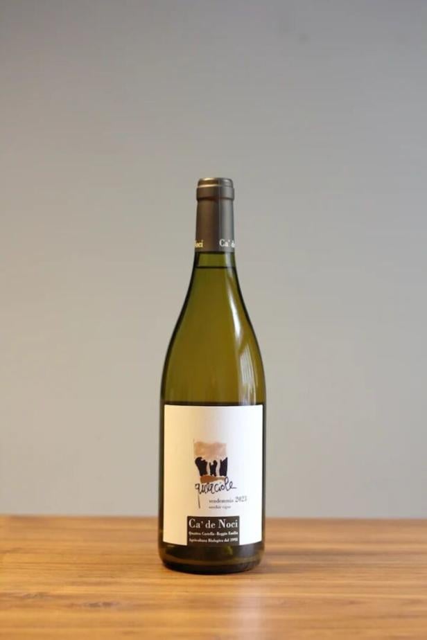 eine grüne Sektflasche