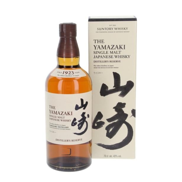 Eine Flasche Yamazaki Single Malt Japanese Whisky steht neben einer passenden Verpackung mit japanischer Schrift.