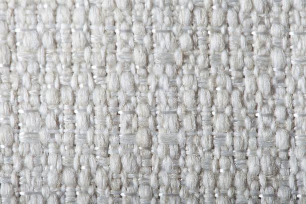 Detail of textured and colorful brand new fabric