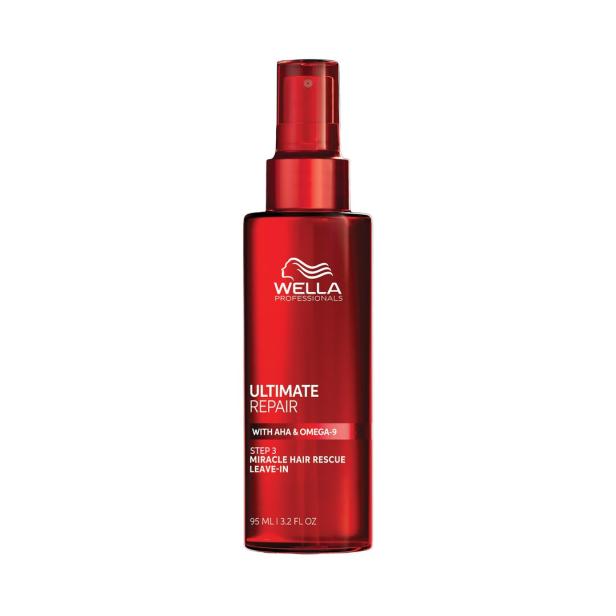 Rote Sprühflasche mit weißer Aufschrift von Wella Professionals, Ultimate Repair Haarpflegeprodukt.