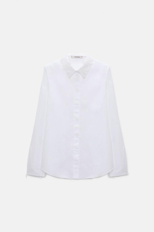 Weiße Bluse mit Spitzenkragen