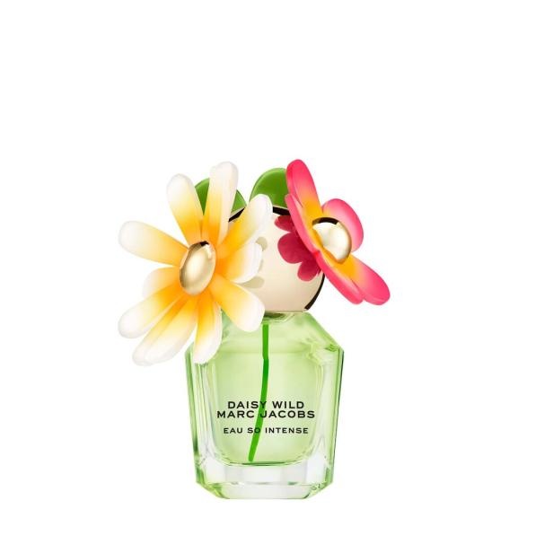 Ein grünes Parfum mit einem Verschluss aus Blumen