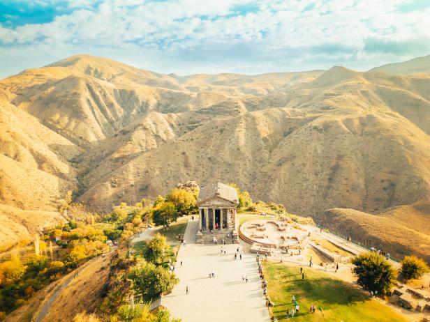 Aerial view of the famous Garni temple in Armenia. The historic Greek style building is located on the edge of a picturesque gorge. Travel and Tourism locations