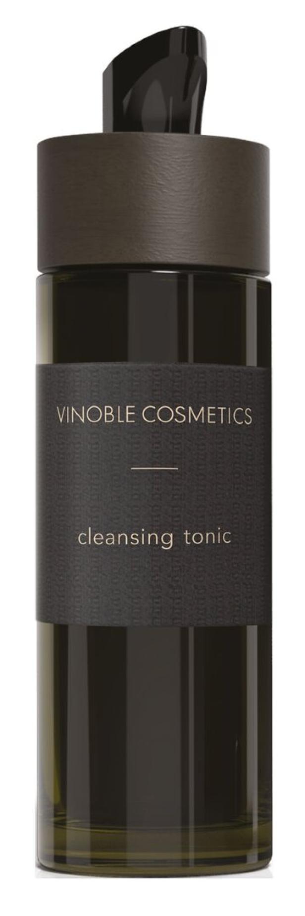 Eine dunkelgrüne Flasche mit schwarzem Etikett und der Aufschrift „Vinoble Cosmetics cleansing tonic“.