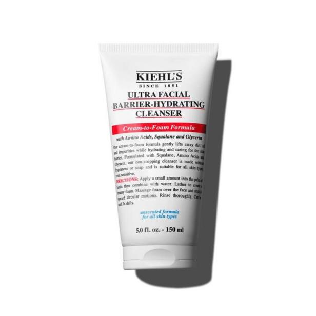 Weiße Tube mit schwarzer und roter Schrift, Kiehl’s Ultra Facial Barrier-Hydrating Cleanser, 150 ml, steht aufrecht.
