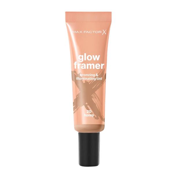 Eine Tube mit bronzefarbenem Glow Framer von Max Factor in der Nuance 20 Honey mit schwarzem Verschluss.