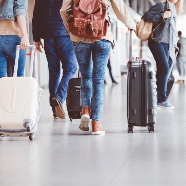 Passengers walking in the airport terminal