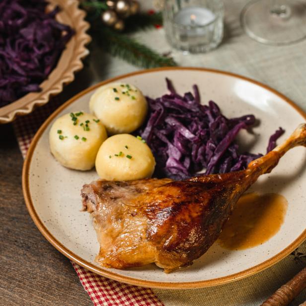 Delicious roast duck with red cabbage and dumplings