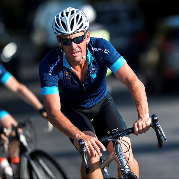 FILE PHOTO: Cyclist Lance Armstrong of the US cycles with a team of riders as he takes part in Geoff Thomas's 'One Day Ahead' charity event during a stage of the 102nd Tour de France cycling race from Muret to Rodez