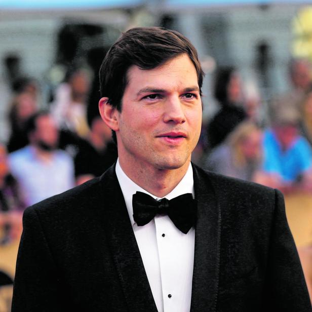 FILE PHOTO: Actor Ashton Kutcher arrives at the 23rd Screen Actors Guild Awards in Los Angeles