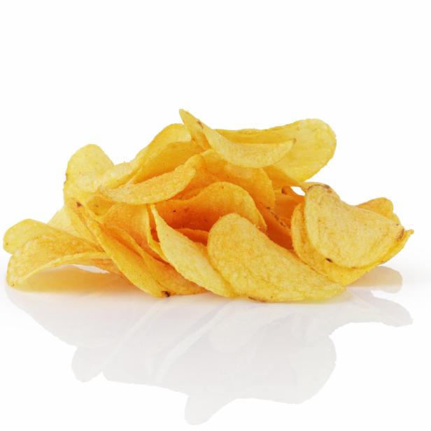 heap of potato chips with paprika