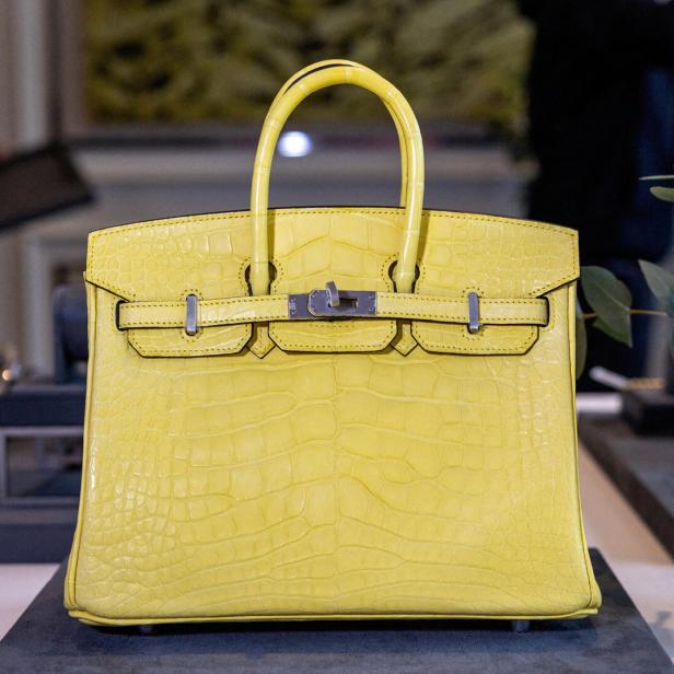 FILE PHOTO: A Mimosa Matte Mississippiensis Alligator Birkin handbag by Hermes is pictured during an auction preview at Sotheby's in Geneva FILE PHOTO: A Mimosa Matte Mississippiensis Alligator Birkin handbag by Hermes is pictured during an auction preview at Sotheby's in Geneva