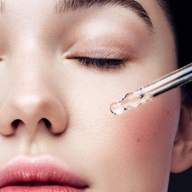 Close-up portrait of beautiful girl getting skin anti aging treatment
