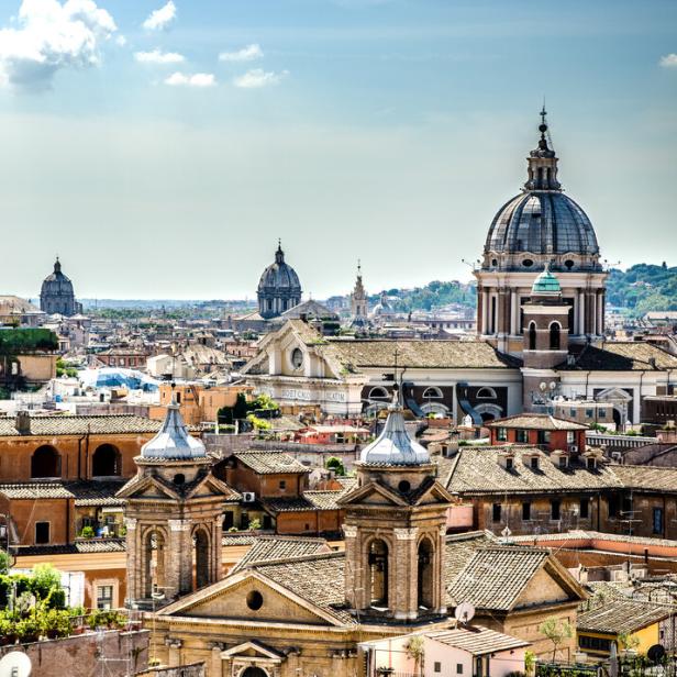 View of the sunlit city from one of the hills. Rome. Italy