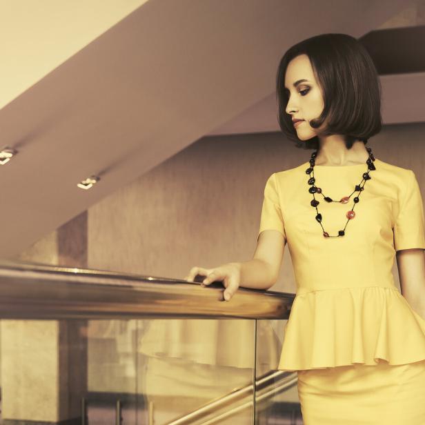 Young fashion business woman in office interior Young fashion business woman in office interior
