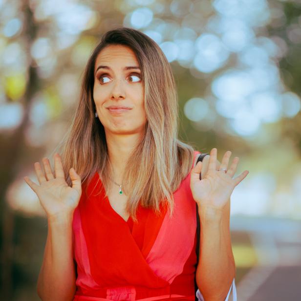 Person Pretending Not to See Someone Waving and Saluting