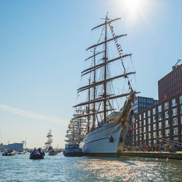 Ships sailing and mooring in the harbor of Amsterdam Ships sailing and mooring in the harbor of Amsterdam