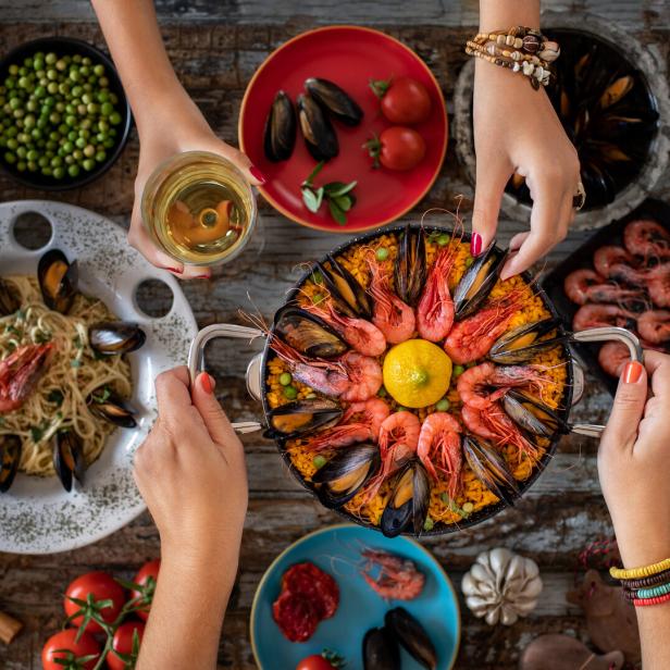 Seafood pasta and paella with mussels. Spaghetti Alle Vongole .