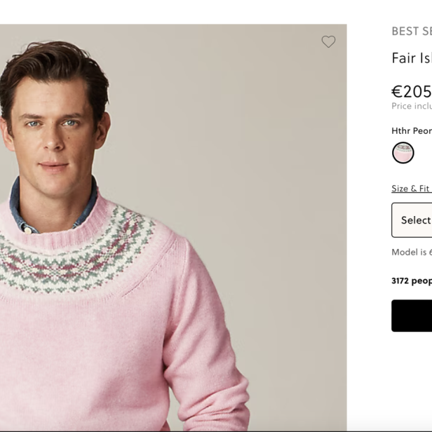Männermodel in einem rosa Weihnachtspulli von J.Crew.