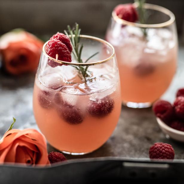 Cocktail with rosÃ© wine and raspberries
