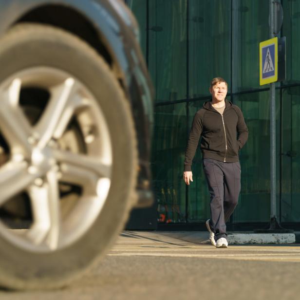 Photography of handsome man in spring sunny day outdoors